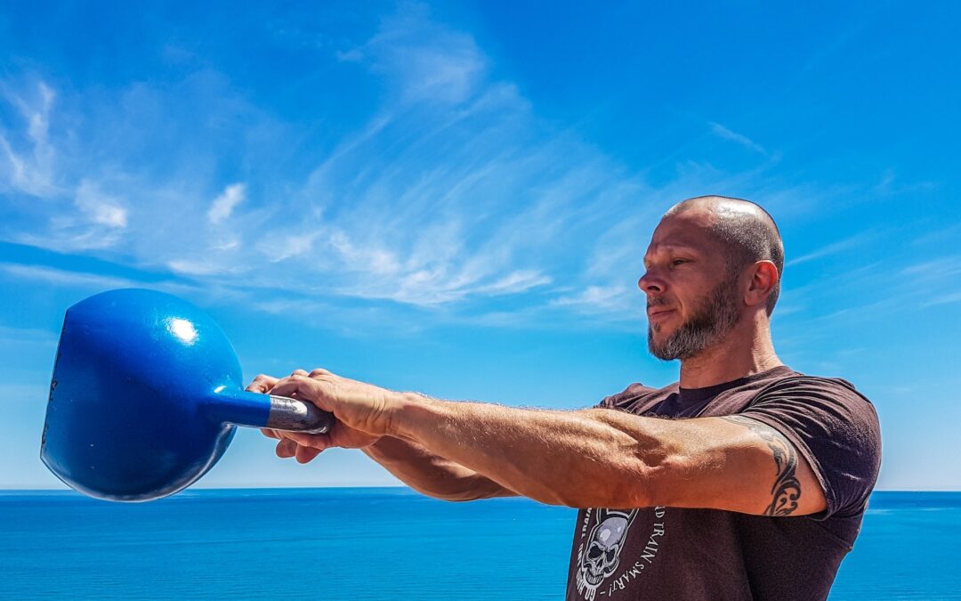 5 Workouts Using Only A Kettlebell